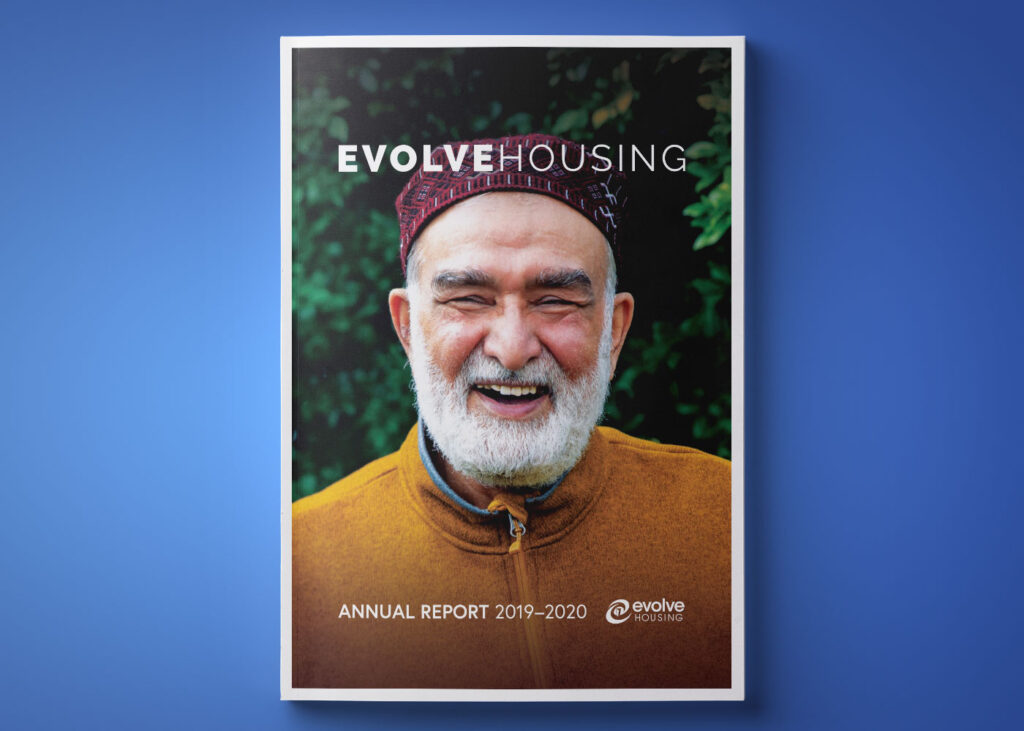 front cover of 2020 annual report. man smiling with words evolve housing annural report 2019-2020 written on page